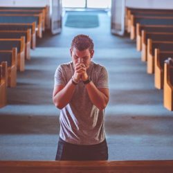 TFTBO-ManPrayingInChurch