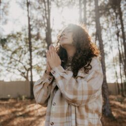 tftbo-woman-praying-in-forest